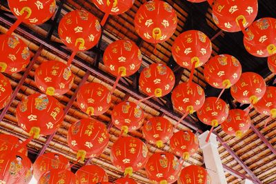 Full frame shot of lantern hanging in orange