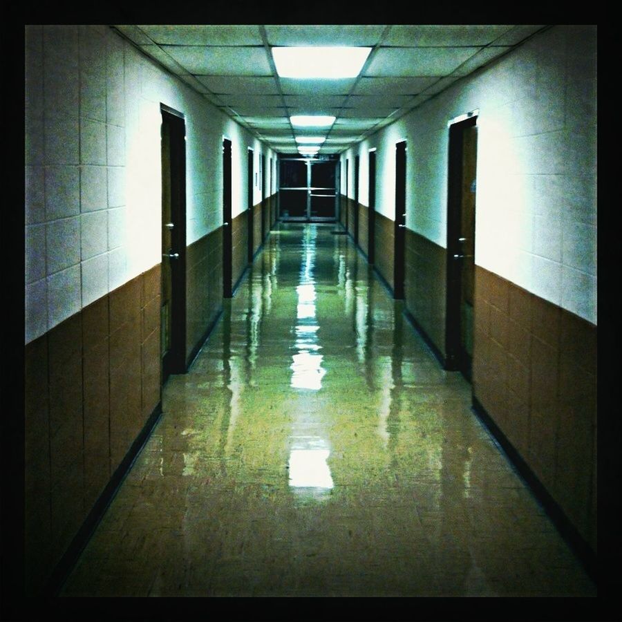 CORRIDOR IN ILLUMINATED BUILDING