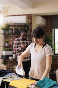 Side view of man working at home