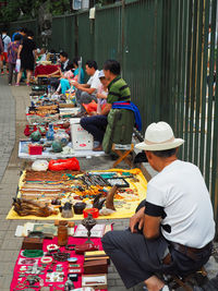 People at market stall