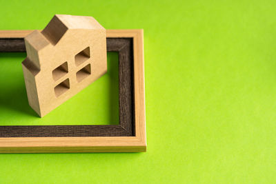 Close-up of toy against green background