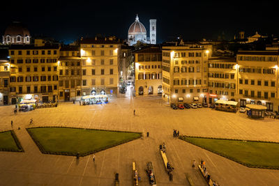 High angle view of buildings at night