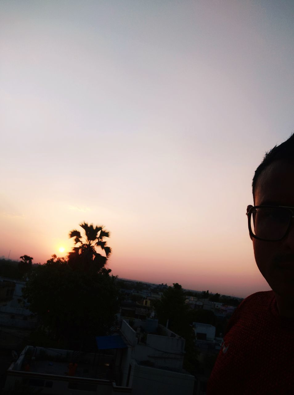 PORTRAIT OF SILHOUETTE MAN AGAINST ORANGE SKY DURING SUNSET