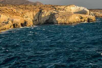 Scenic view of rock formation in sea