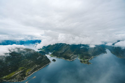 Aerial view of mountain by sea