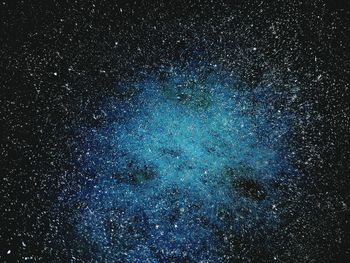 Full frame shot of star field against black background