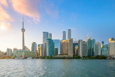 Modern buildings in city against sky