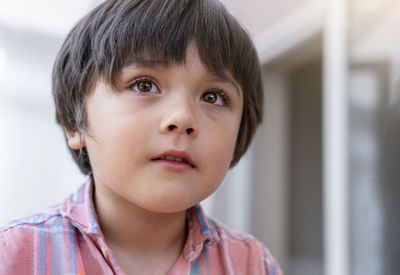 Close-up portrait of cute boy