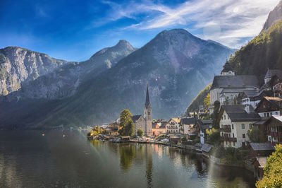 Panoramic view of river amidst mountains against sky