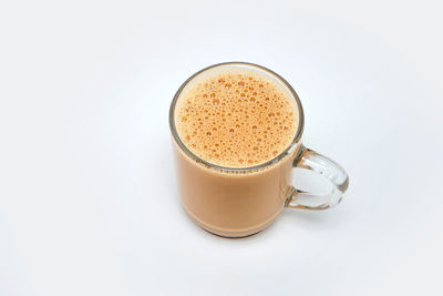 High angle view of coffee against white background