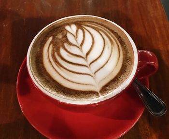 Close-up of cappuccino on table