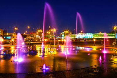 Illuminated city at night