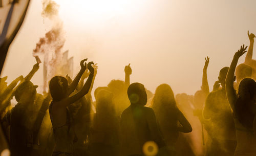 People enjoying beach party