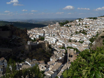 Aerial view of town against sky