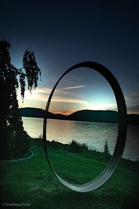 Scenic view of sunset over lake