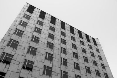 Low angle view of office building against sky