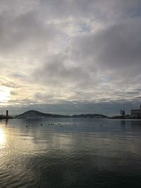 Scenic view of sea against sky at sunset