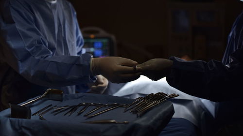 Defocused image of surgeons in operating room