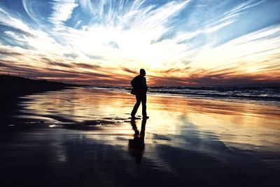 Scenic view of sea at sunset