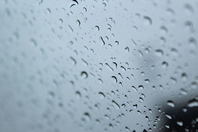 Close-up of water drops on glass