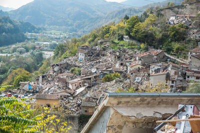 High angle view of townscape against mountain