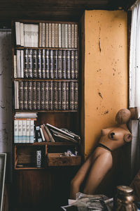 Mannequin with books