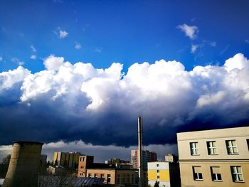 Cityscape against blue sky