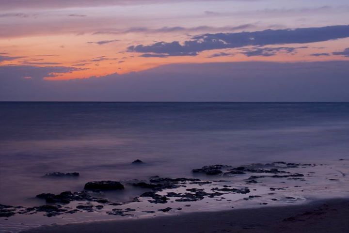 sea, horizon over water, water, scenics, tranquil scene, sunset, tranquility, beauty in nature, beach, sky, shore, nature, idyllic, cloud - sky, dusk, orange color, seascape, coastline, remote, sand