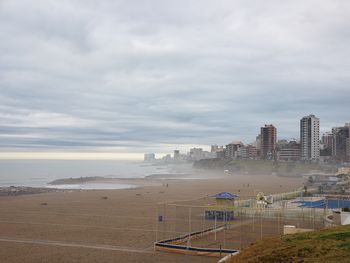 High angle view of beach against sky during sunset