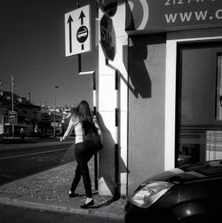 Woman standing in city