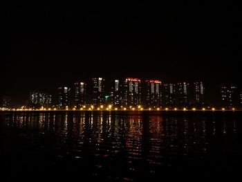 Illuminated cityscape at night