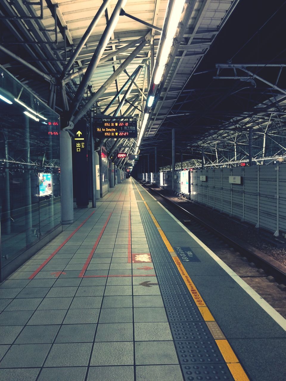 railroad track, rail transportation, transportation, railroad station platform, railroad station, the way forward, public transportation, diminishing perspective, vanishing point, built structure, architecture, indoors, empty, station, travel, long, train - vehicle, railway station, railway track, public transport