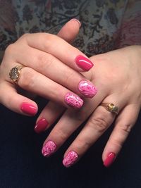 Close-up of woman hand with pink hands