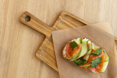 High angle view of bread on cutting board