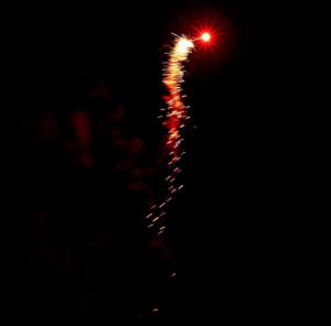 Close-up of firework display at night