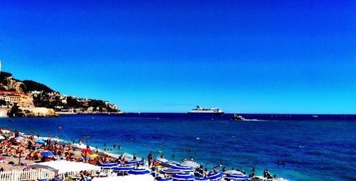 Scenic view of calm sea against clear sky