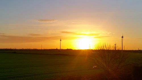 Scenic view of landscape at sunset