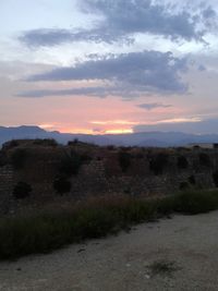 Scenic view of landscape against sky during sunset