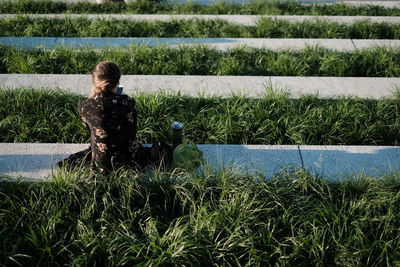 Woman sitting on grass