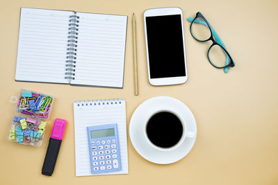 Directly above shot of coffee cup on table