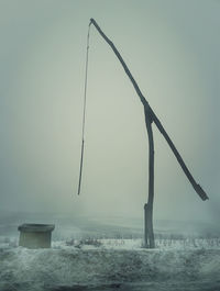 Scenic view of sea against sky during winter
