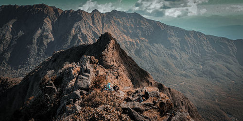 Panoramic view of rocks and mountains against sky