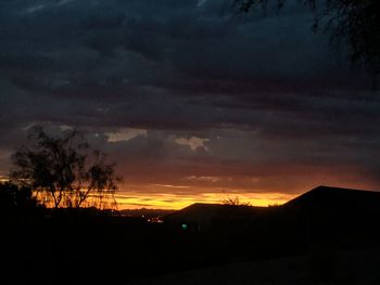 Scenic view of silhouette landscape against sky during sunset