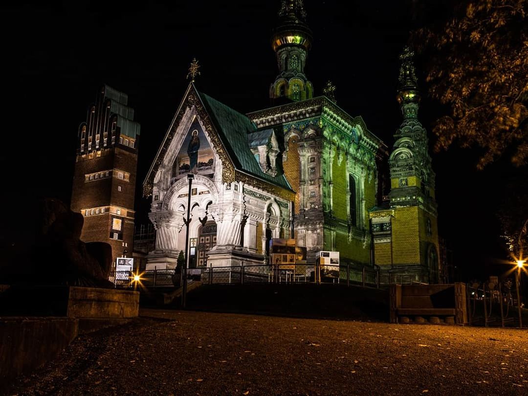 architecture, built structure, night, building exterior, religion, place of worship, belief, building, spirituality, travel destinations, illuminated, no people, nature, history, the past, tree, gothic style, spire