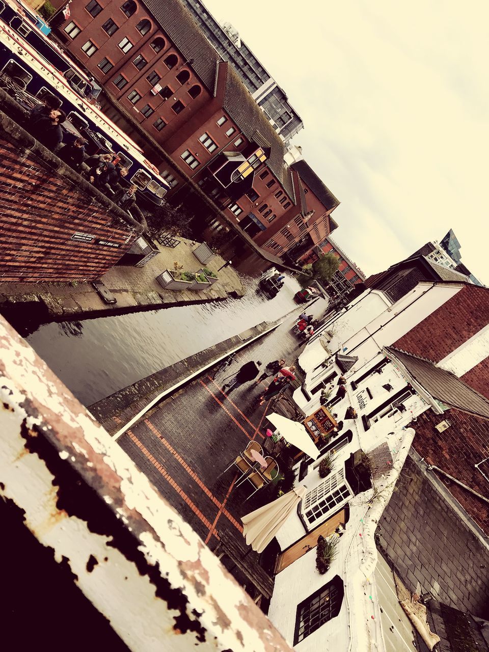 HIGH ANGLE VIEW OF BUILDINGS AGAINST SKY