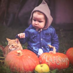 Portrait of cute baby girl eating food