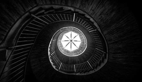 Low angle view of spiral staircase in building