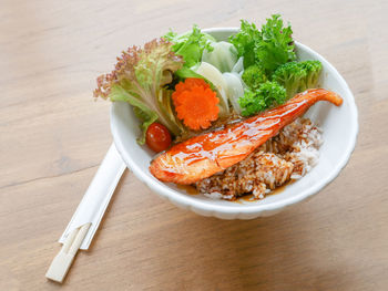 High angle view of salad in bowl on table