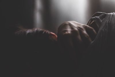 Close-up of young woman sleeping at home