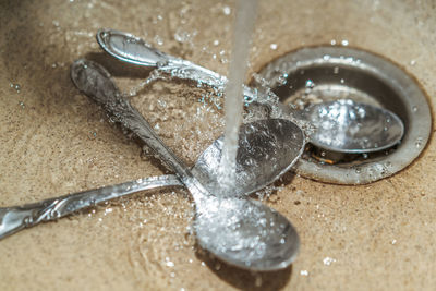 High angle view of water in container on table